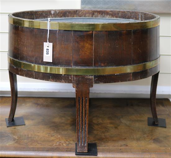 A George III style brass mounted oak wine cooler W.66cm